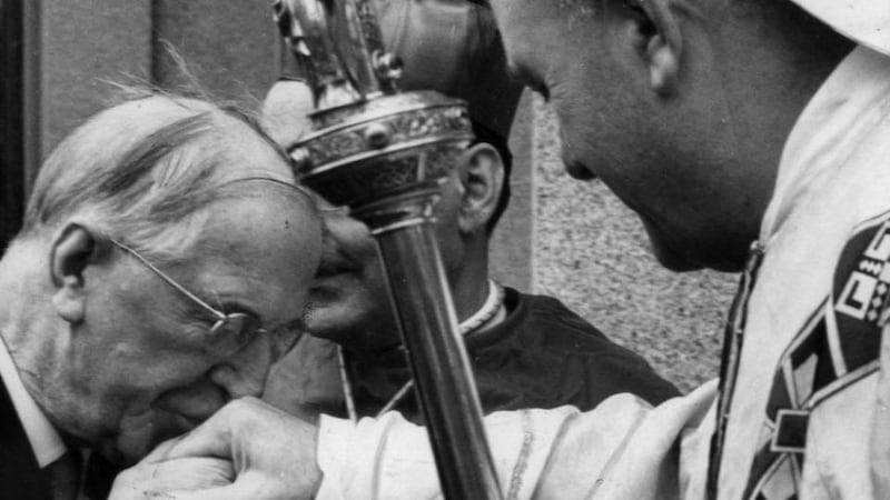 President de Valera kisses the ring of Cardinal Conway