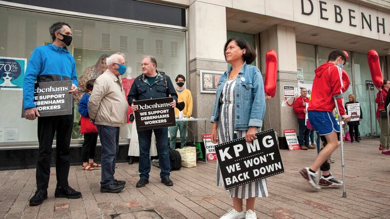 Former Vita Cortex workers, who spent 161 days fighting for a better redundancy agreement supporting former Debenhams workers in Cork city. Valerie Conlon (foreground) had been working in the Cork shop for years. Photograph: Daragh Mc Sweeney/Provision
