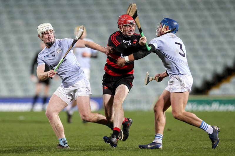 Ballygunner's Billy O'Keeffe is challenged by Will Henn and Mike Casey of Na Piarsaigh. Photograph: Laszlo Geczo/Inpho