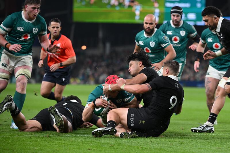 Josh van der Flier of Ireland burrows over to score a try against New Zealand. Photograph: Charles McQuillan/Getty Images