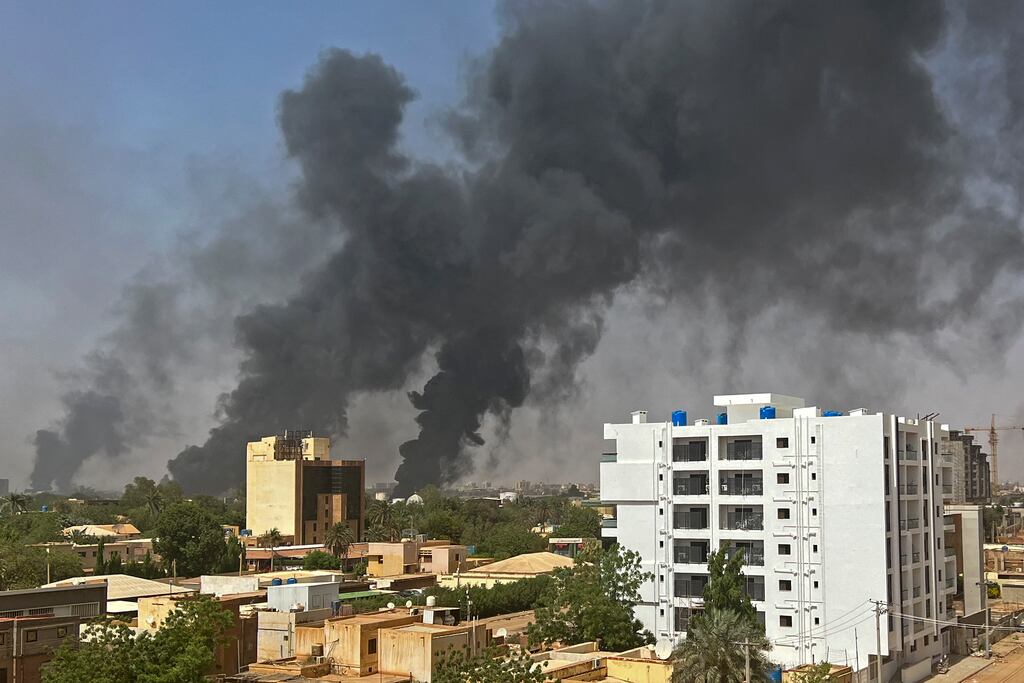 Smoke billows above residential buildings in Khartoum on April 16th, as fighting in Sudan raged for a second day in battles between rival generals. Photograph: AFP via Getty Images