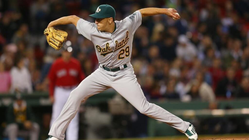 The ambidextrous Major League Baseball player Pat Venditte pitched left-handed before switching his glove from his right to left hand. Photo by Jim Rogash/Getty Images
