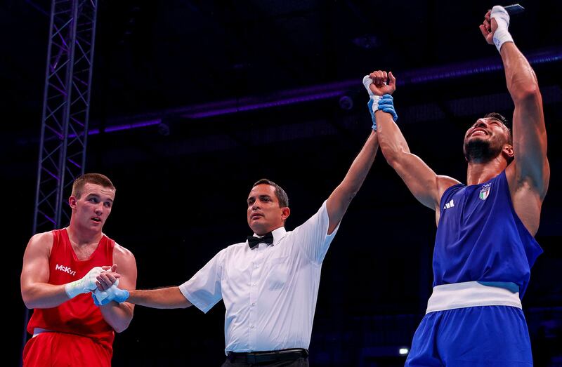 Italy’s Aziz Abbes Mouhiidine is declared the winner after his fight against Jack Marley. Photograph: Tom Maher/Inpho
