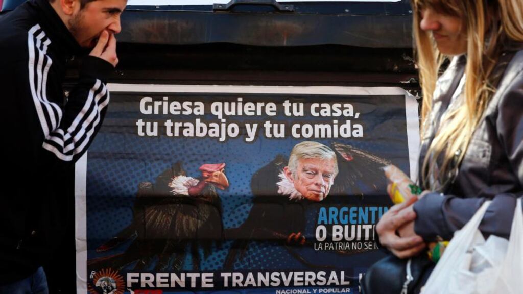 A poster in Buenos Aires this week depicts New York judge Thomas Griesa as a vulture. Judge Griesa is overseeing Argentina’s long-running battle with hedge funds over defaulted debt. The poster, run by political organisation Transversal Front, reads, “Griesa wants your house, your job and your food”. Photograph: Marcos Brindicci/Reuters