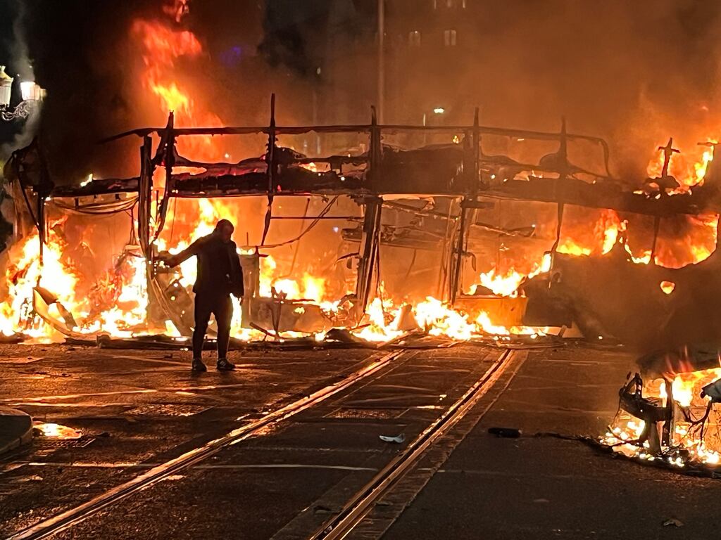 On O’Connell Street buses and cars burn. Photograph Alan Betson/The Irish Times