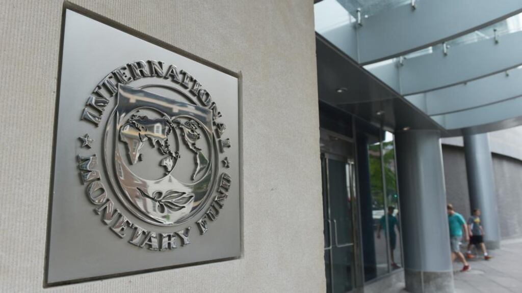 The seal of the International Monetary Fund is seen on a headquarters building in Washington, DC on July 5, 2015. The euro was dropping against the dollar after early results of the Greece bailout referendum suggested the country rejected fresh austerity demands from EU-IMF creditors. AFP PHOTO/MANDEL NGANMANDEL NGAN/AFP/Getty Images