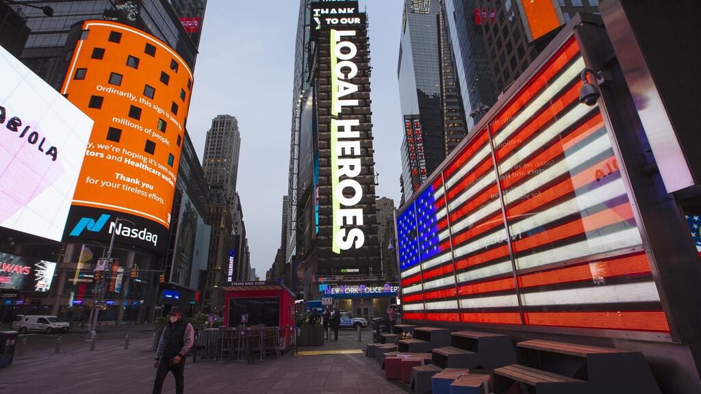Billboards in the Times Square area of New York display messages thanking first responders and front line workers battling coronavirus. Photograph: Angus Mordant/Bloomberg