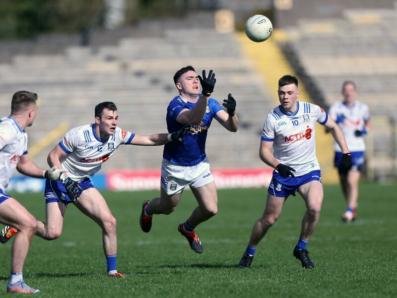 Cavan's Niall Carolan with Monaghan's Ciaran McNulty and Jason Irwin. Monaghan have a great chance of emerging from their group. Photograph: John McVitty/Inpho