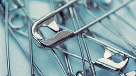 Britons combat post-Brexit racism by wearing safety pins