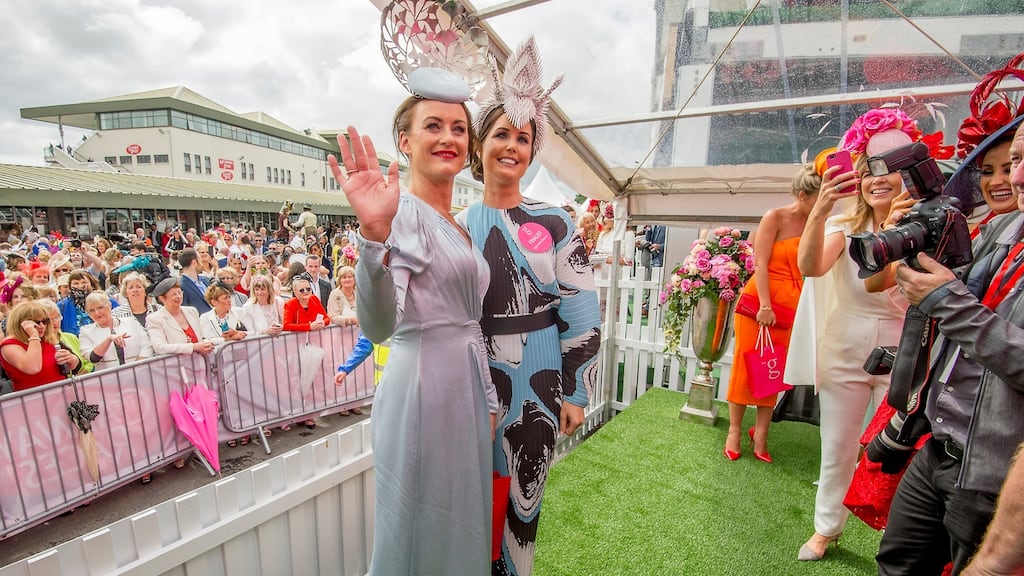 Aoife McCana, left, winner of the Best Dressed Lady at the Galway Races and Oniesa Owens, Cavan, who won for Best Hat. Photograph: Brenda Fitzsimons