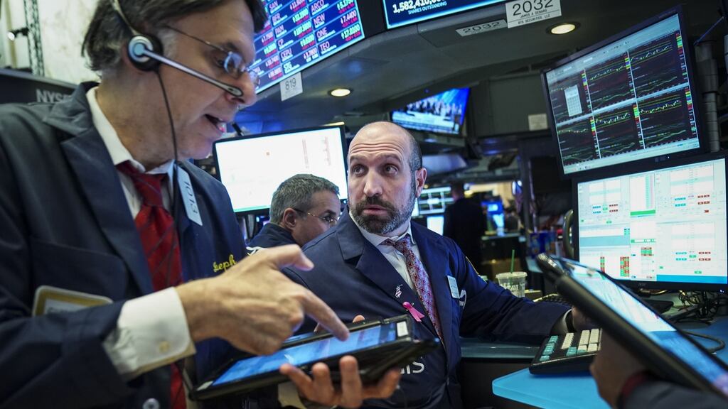 US markets dipped sharply again on Tuesday, with the Dow Jones Industrial Average closing over 500 points down. Technology stocks, including Apple, continue to drag down the markets. Photograph: Drew Angerer/Getty Images