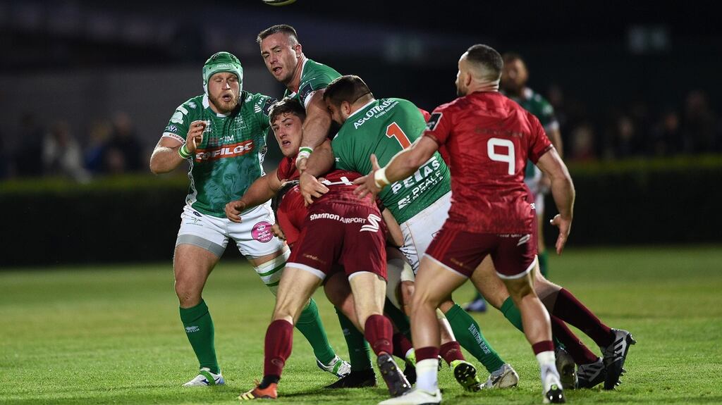 Munster’s Darren O’Shea offloads during the Guinness Pro 14 game against Benetton at Stadio Monigo in Treviso. Photograph: Elena Barbini/Inpho