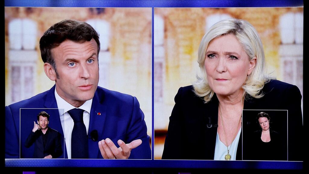 Live televised debate between French president Emmanuel Macron and far-right party Rassemblement National candidate Marine Le Pen. Photograph: Ludovic Marin/AFP via Getty