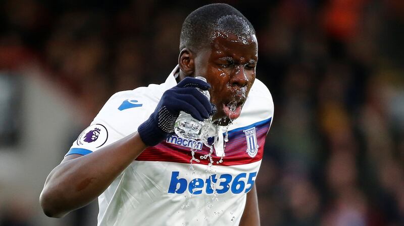 Stoke City’s Kurt Zouma pours water over his face. Photograph: Tolga Akmen/Reuters