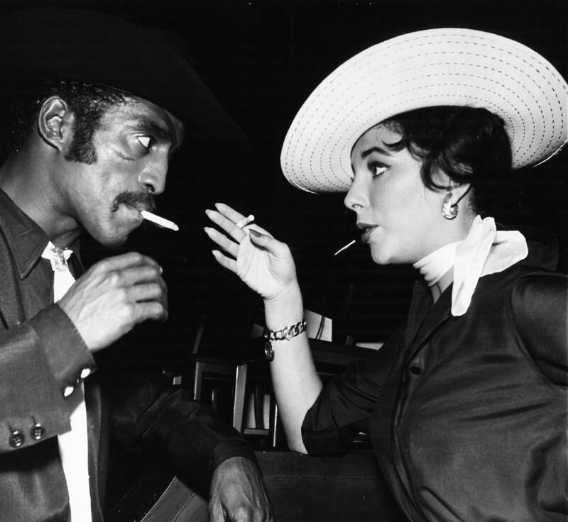 Golden age: Sammy Davis jnr with Joan Collins at a party in Hollywood in 1958. Photograph: Pictorial Parade/Archive/Getty