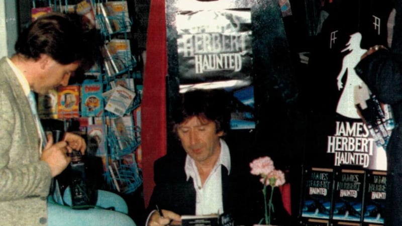 Patsy McGarry of Capital Radio at a book signing with the late James Herbert in 1989