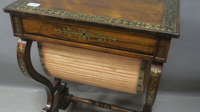 Lot 205: Regency rosewood and brass inlaid work table (€2,400-€2,800).