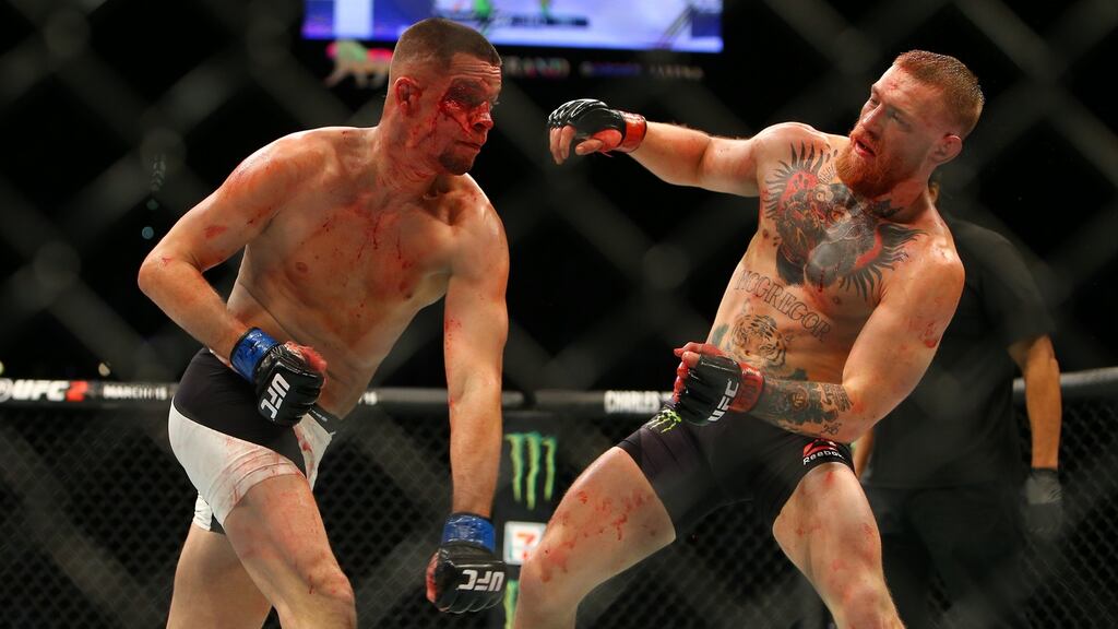 Nate Diaz punches Conor McGregor during UFC 196 at the MGM Grand Garden Arena on March 5th, 2016 in Las Vegas, Nevada. Photograph: Rey Del Rio/Getty Images)