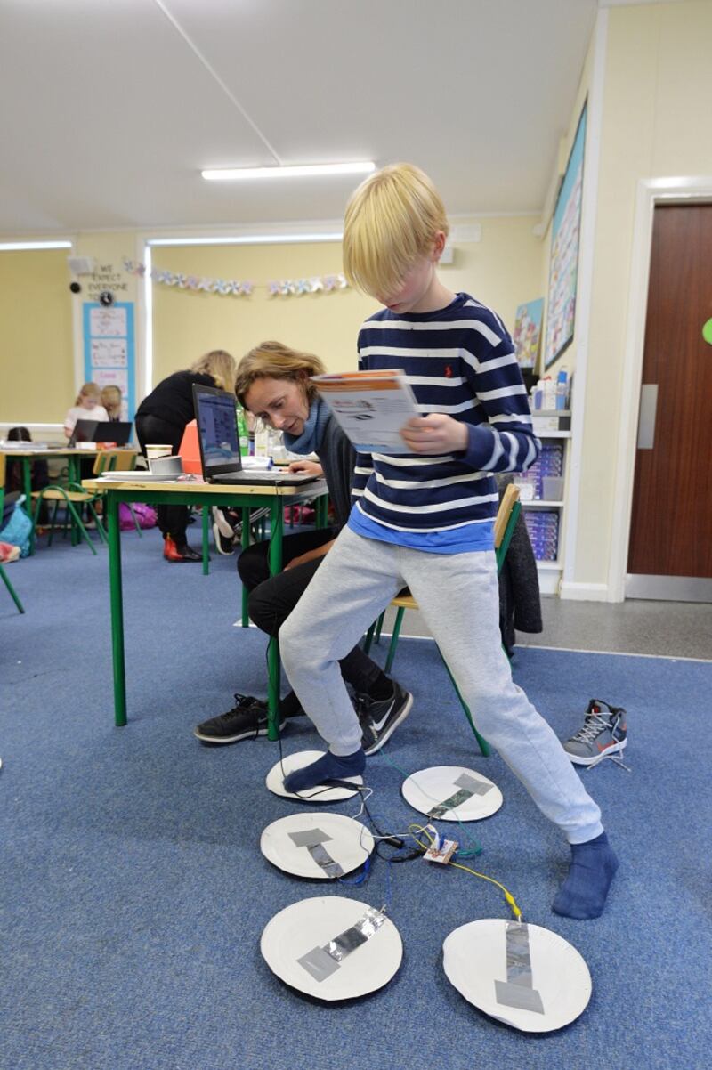 Lucy and Daniel Hughes attending the OurKidsCode family workshop.