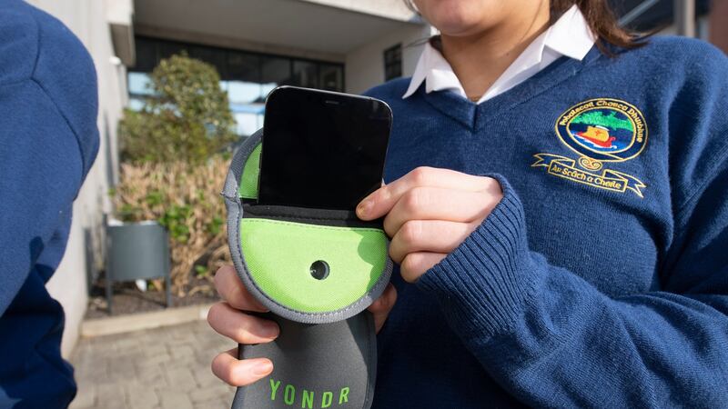 Pobalscoil Chorca Dhuibhne student Faye Greely puts her phone in a secure magnetic pouch for the duration of school. Photograph: Domnick Walsh