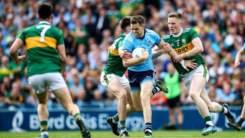 Kerry’s Tom O’Sullivan and Jason Foley in action against Dublin’s Dean Rock. Photograph: James Crombie/Inpho