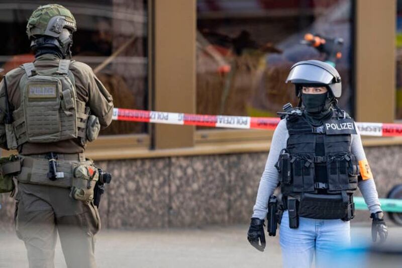German police at the scene of the incident on Tuesday evening. Photograph: AP