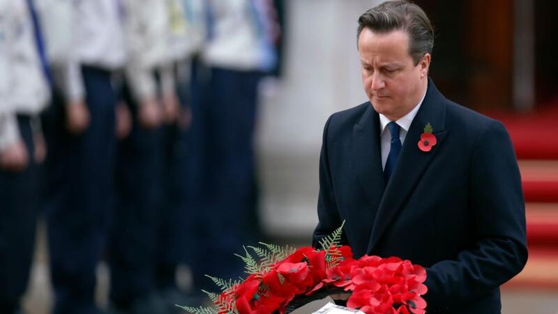 Britain’s prime minister David Cameron lays a wreath at the annual Remembrance Sunday ceremony at the Cenotaph in London. Photograph: Luke MacGregor/Reuters