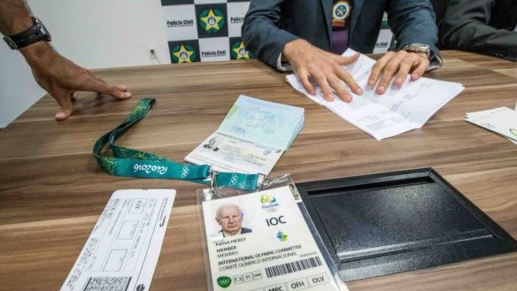 Olympic Council of Ireland president Pat Hickey’s passport and accreditation on show during Friday’s police press conference in Rio. Photograph: Morgan Treacy/Inpho