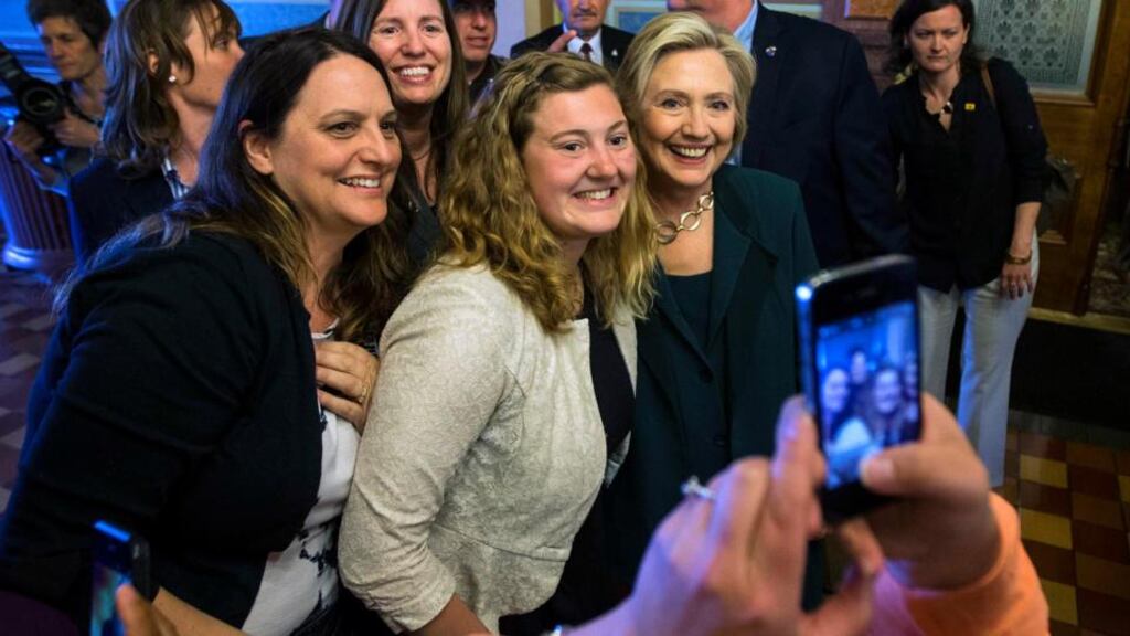 Three’s company: Hillary Clinton’s early pit stops and political events have been aimed at showcasing her everyday side, far more so than she ever did during the 2008 campaign. Photograph: The New York Times