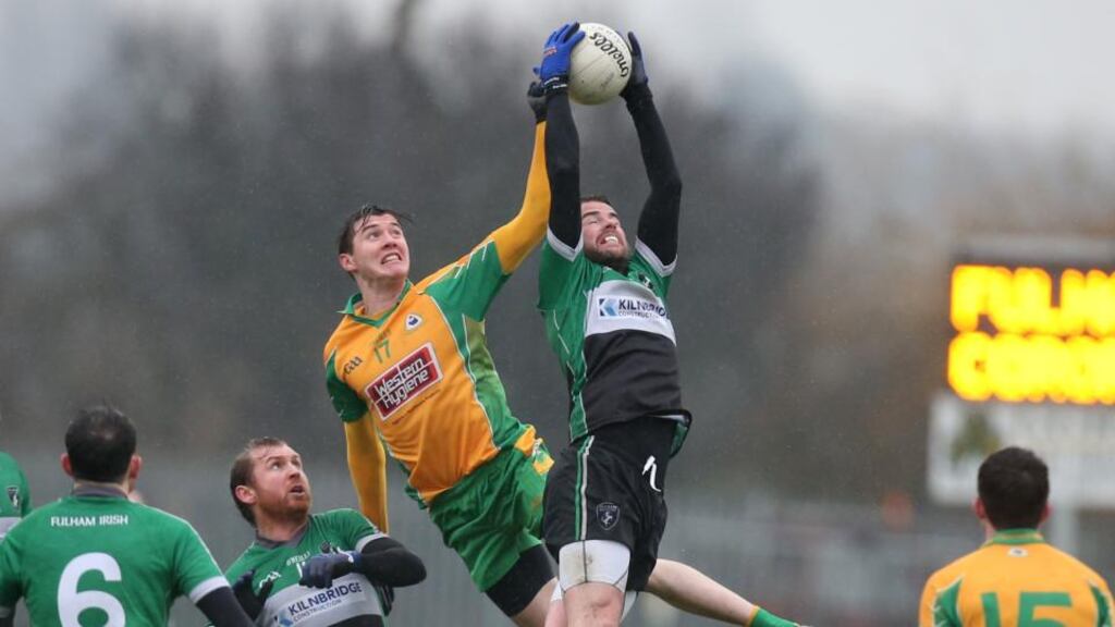 Fulham’s Michael Murphy with Corofin’s Cathal Silke during their clash at Ruislip. Photo: Gerry McManus/Inpho