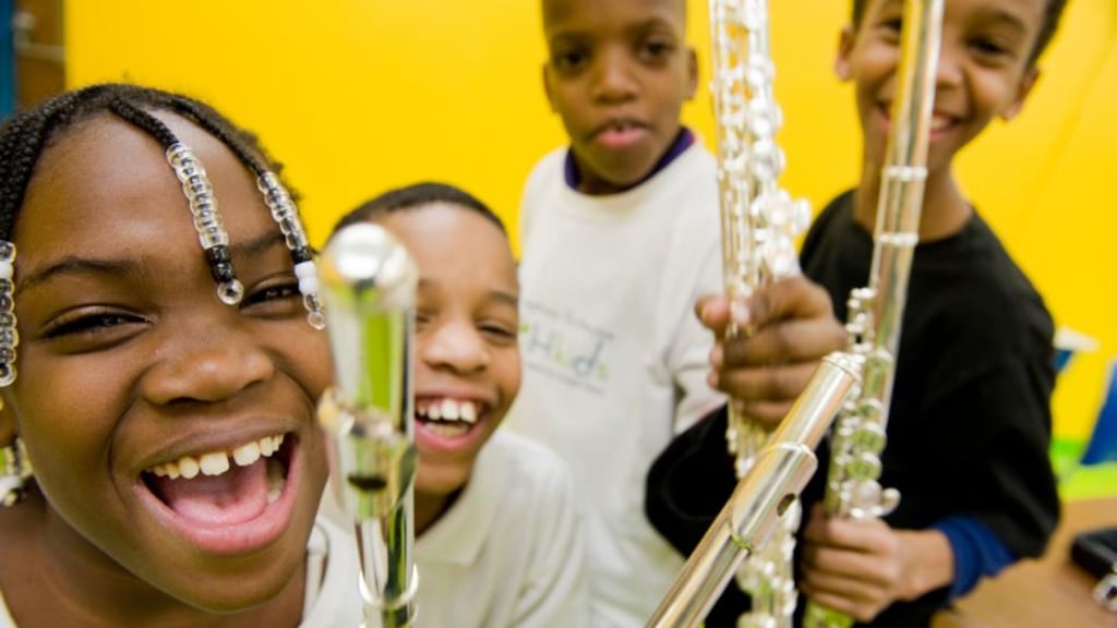 OrchKids: children from Baltimore’s OrchKids initiative, which provides instruments, music education, academic instruction and healthy food. Photograph: Bill Dennison