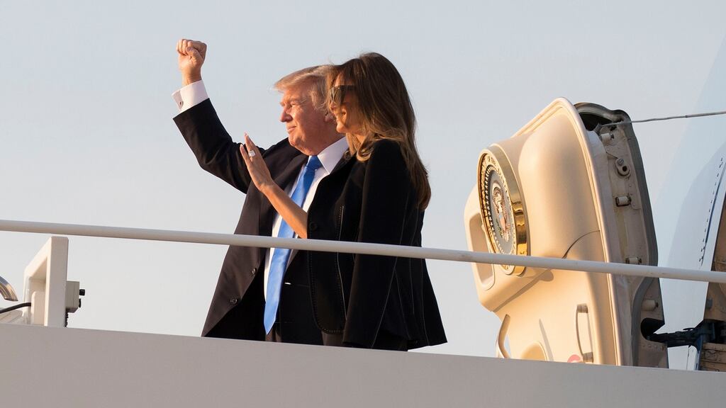 US president Donald Trump and first lady Melania Trump board Air Force One, Wednesday, July 12th, 2017, en route to Paris. Photograph: Carolyn Kaster/AP
