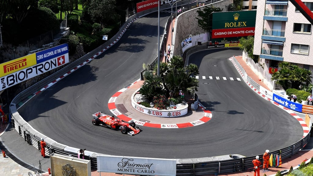 Ferrari’s German driver Sebastian Vettel steers his car through the Fairmont hairpin during the second practice session in Monaco. Photograph: Andrej Isakovic/AFP/Getty Images