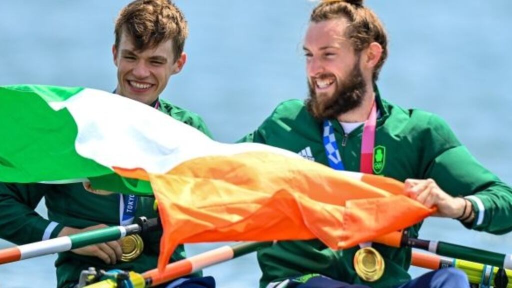 Fintan McCarthy and Paul O’Donovan celebrate their gold medal victory in the Men’s Double Sculls at the Sea Forest Waterway, Tokyo. Photograph: Steve McArthur/Inpho