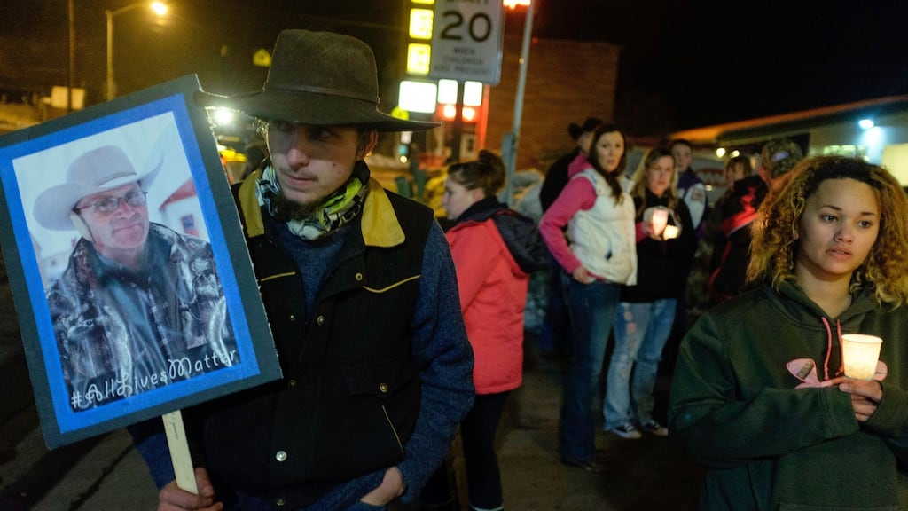 More than 20 people marched up and down North Broadway Avenue in Burns, Oregon, holding a candlelight celebration of the life of Robert “LaVoy” Finicum. He was killed after an armed occupation of a wildlife refuge. Photograph: Rob Kerr/AFP/Getty Images