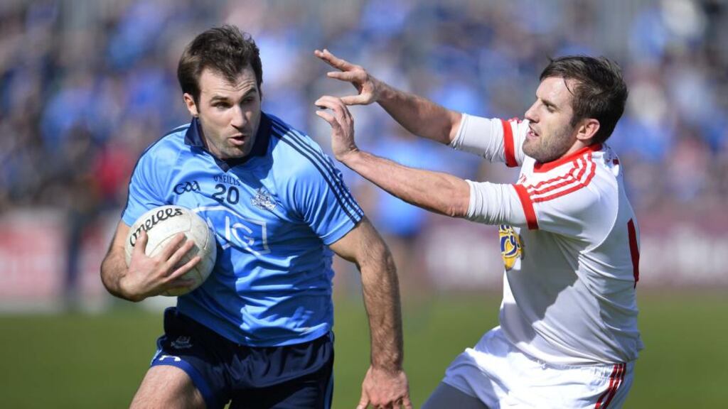 Tyrone’s Mark Donnelly closes down Bryan Cullen of Dublin. Photograph: Russell Pritchard/Inpho