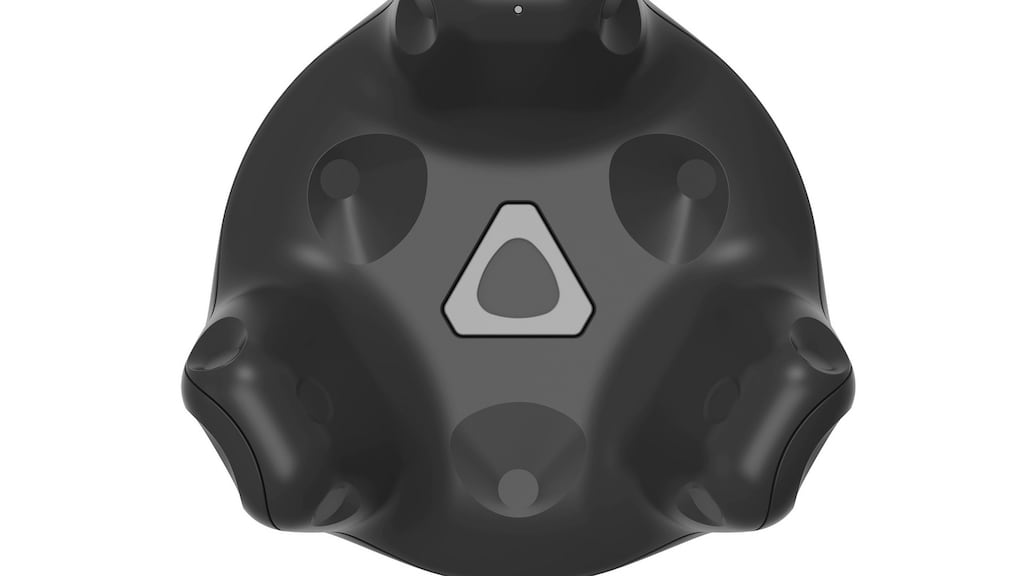 The new HTC Vive Tracker, a motion tracking sensor that can be attached to physical objects, making them useable while wearing the Vive headset. Photograph: PA