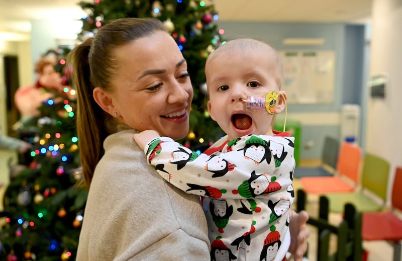 Republic of Ireland captain Katie McCabe with 14-month-old Zoe Mills during a visit to patients, families and staff at Children’s Health Ireland at Crumlin in Dublin. Photograph: Stephen McCarthy/Sportsfile