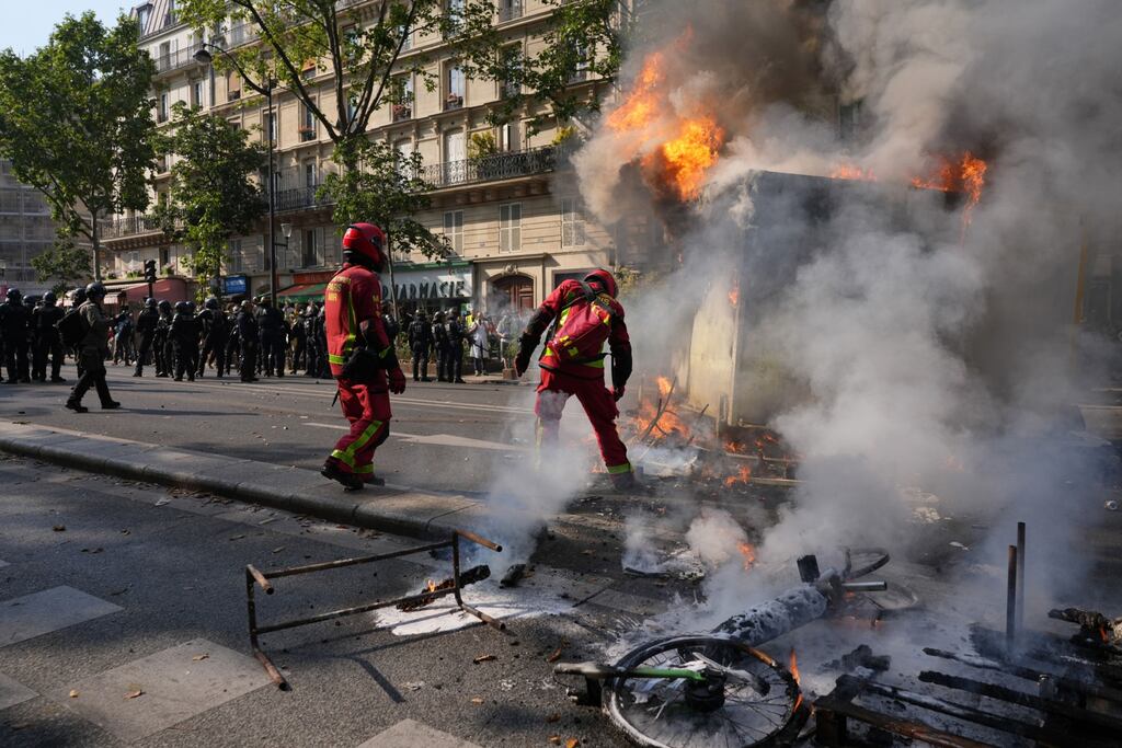 Anti-pension reform protesters in central Paris on June 6th. Holidaymakers should check their travel insurance as unrest threatens to disrupt travel summer travel plans. Photograph: Nathan Laine/Bloomberg