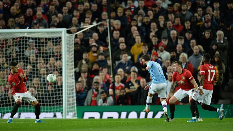 Manchester City’s Bernardo Silva scores the opening goal of the game. Photo: Peter Powell/EPA