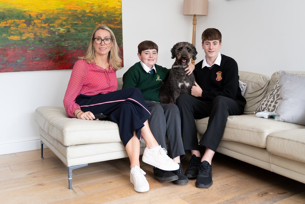 Suzanne Tracy, Siro’s chief technology officer, at home with her sons Luke and Patrick and Frankie the labradoodle