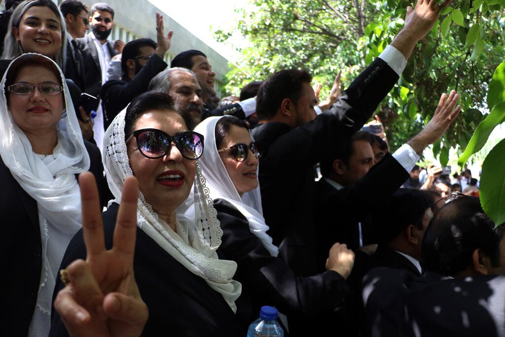 Lawyers supporting Pakistan's former prime minister Imran Khan react outside a court in Islamabad on Tuesday after his conviction for corruption was suspended. Photograph: Sohail Shahzad/EPA