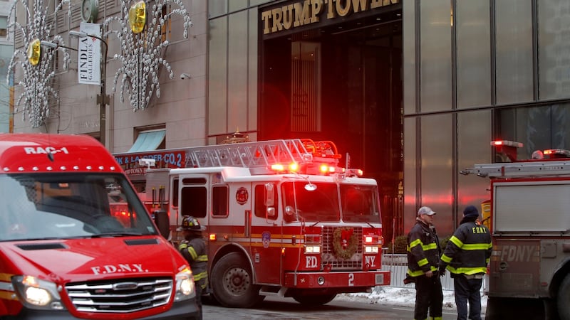 New York Fire Department crew respond after a fire broke out at Trump Tower in Manhattan, New York. Photograph: REUTERS/Andrew Kelly