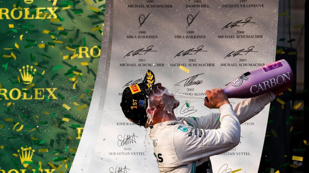 Valtteri Bottas of Mercedes AMG GP celebrates with champagne after winning the 2019 Formula One Grand Prix of Australia at the Albert Park Grand Prix Circuit in Melbourne. Photo: Diego Azubel/EPA