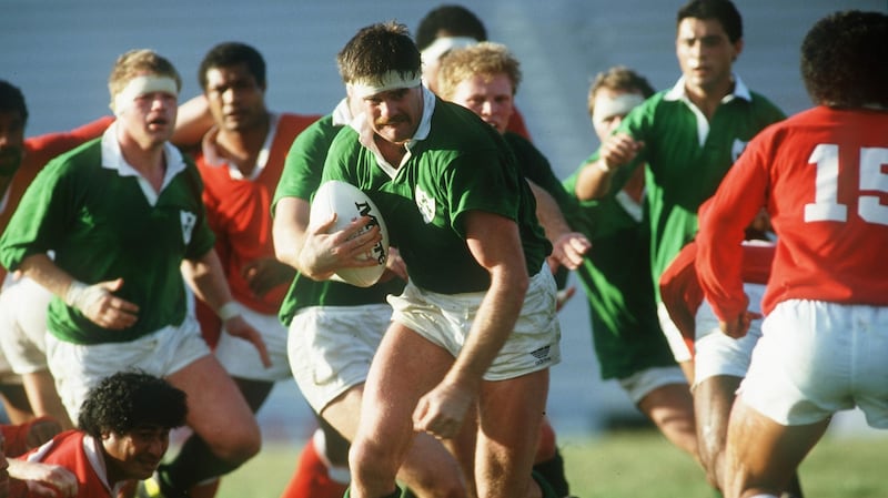 Willie Anderson runs with the ball during Ireland’s game against Tonga at the 1987 Rugby World Cup. Photograph: Billy Stickland/Inpho
