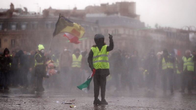 A protester during a demonstration near the Arc de Triomphe. Photograph: Reuters