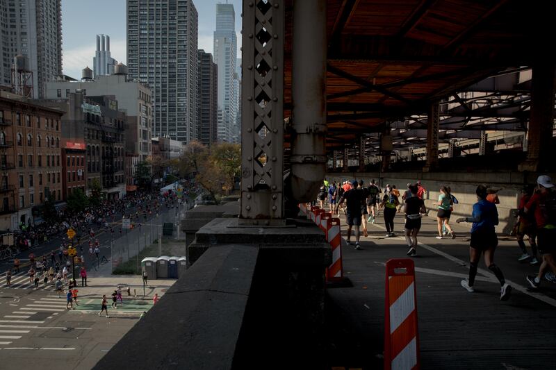 Runners cross the Queensboro Bridge during the New York City Marathon. Photograph: Anna Watts/The New York Times