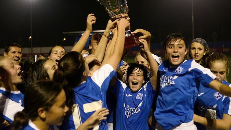 Members of AEM Lleida, a girls amateur soccer team, celebrate a 3-2 victory and their league championship in Lleida, Spain, on April 25th, 2017. Photograph: Samuel Aranda/The New York Times
