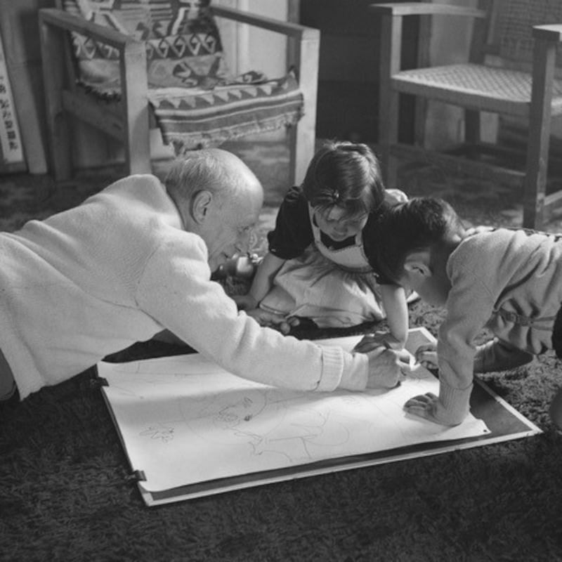Picasso giving a drawing lesson to his children in 1953. Photograph: Edward Quinn Photo Archive