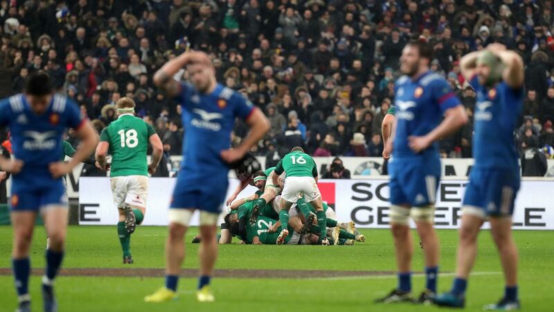 Ireland players celebrate after Johnny Sexton scores the winning drop goal. Photograph: Gareth Fuller/PA Wire.